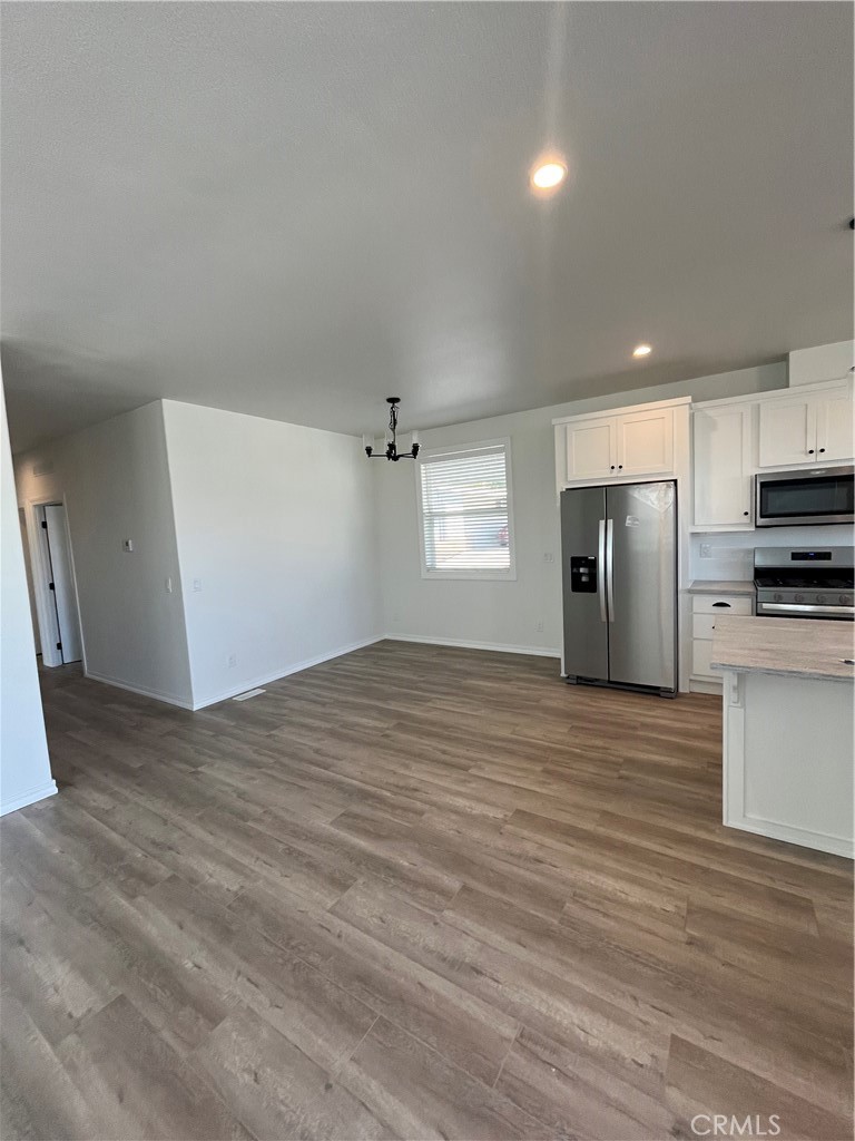 A new manufactured home has arrived at Villa Corona, an All-Age Community in Corona. It is a 2025 Skyline model manufactured home! The house has 4 bedrooms and 2 bathrooms at 1620 sq. ft. approx. and has an open floor plan with a spacious living room. The kitchen has an island, with new stainless steel appliances: a Refrigerator, Dishwasher, Oven/Range, and Built-In Microwave Oven. The bedrooms are nicely sized and the primary bedroom has an adjoining bathroom with double vanity sinks and a walk-in shower. The laundry room has hookups for a full-size washer and dryer. Additional features: laminate flooring in living area only, carpet in bedrooms, central A/C, and Heating. Villa Corona is close to 15 Freeway, Shopping Centers, and Centennial High School. More pictures are coming soon!
