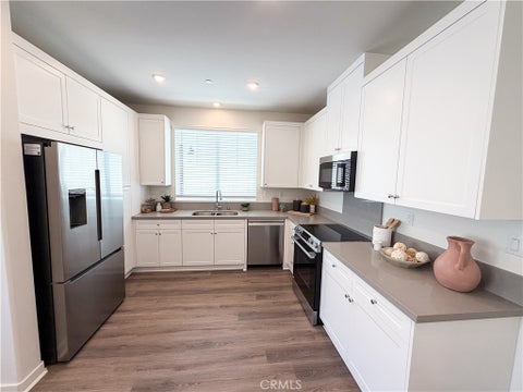 Photo of 7188 Lisbon Way, Highland, CA 92346 (MLS # CV26123164)