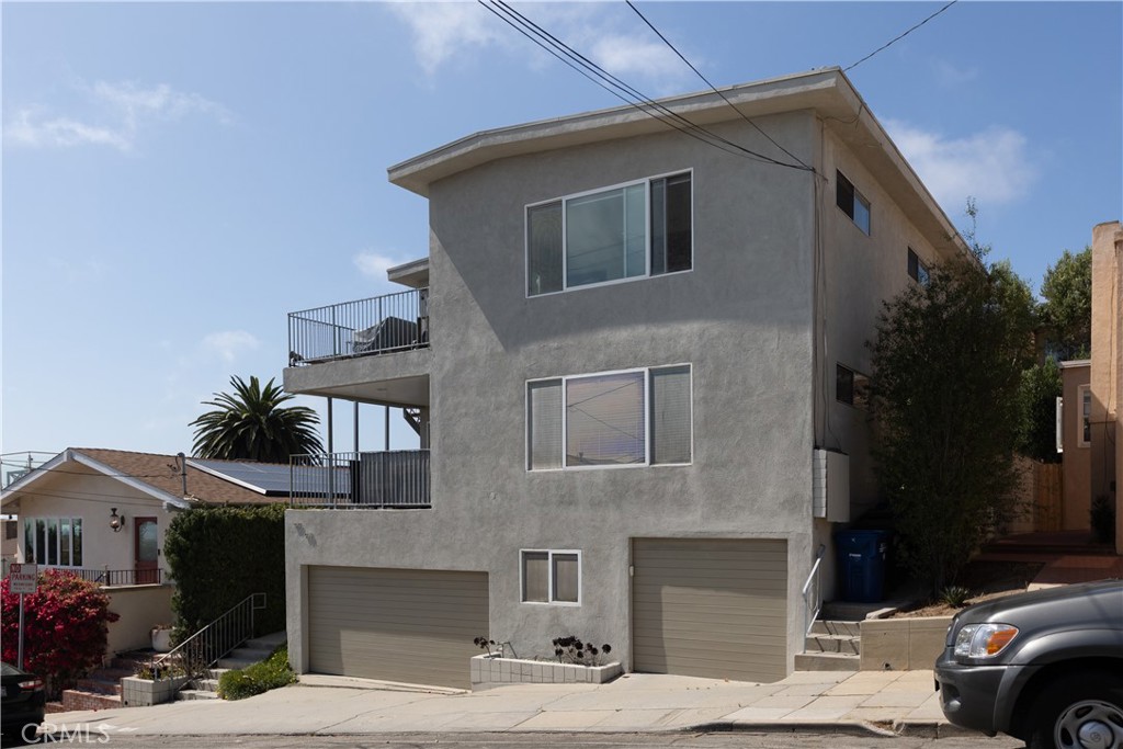 Welcome to 919 14th Street. This is a beautiful top floor unit with panoramic ocean views from PV to Malibu. Large 2 car garage with opener. Beautiful, shared yard area with a lap pool. Pool and Gardener services included. Large extended living view balcony off the kitchen and living room, perfect for relaxing and enjoying the amazing SoCal sunsets. Large common area laundry with free washer/dryer on site. Walking distance to the beach, restaurants and bars. For those who need extra storage space, an additional 350 square foot storage room is available to rent as well. All utilities (gas, electricity) are included with this unit. Owner pays water and trash service. Hurry, this unit will not last and will be available on September 15th.