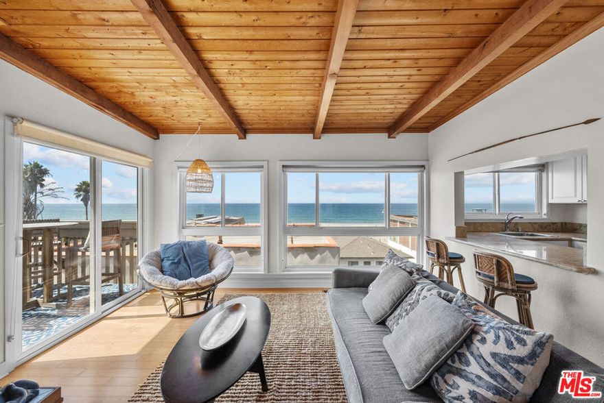 Set one block from the ocean in Manhattan Beach's coveted Sand Section, this upper residence in a two-home duplex showcases sweeping 180-degree coastline views from Palos Verdes to Malibu. The setting is all South Bay energy and ocean horizon, with a front-row vantage point to sunrises, sunsets and the ever-changing Pacific. This two-level 2,300 square feet 3-bedroom 2-bath layout is designed for effortless indoor/outdoor living. Expansive living and dining areas extend to two private view balconies, creating natural zones for relaxing, hosting and taking in the panorama. Sun-filled interiors capture sea breezes throughout the day, delivering a bright, uplifting atmosphere that feels vacation-ready yet completely functional for daily life.Recent upgrades elevate comfort and confidence: new windows, a new roof with copper flashing, central heating, a gas range for precise cooking and a gas fireplace for cool coastal evenings. Thoughtful finishes and a clean presentation allow the views to be the star while keeping the home easy to furnish and enjoy. A private two-car garage with generous storage is a rare advantage in this pocket, adding secure parking and room for boards, bikes and gear. The location puts beach access and The Strand moments away, with the Pier, boutiques, fitness studios, coffee spots and dining all within easy reach. This is the quintessential Manhattan Beach experience: ocean, activity and convenience in one of the area's most desirable neighborhoods.