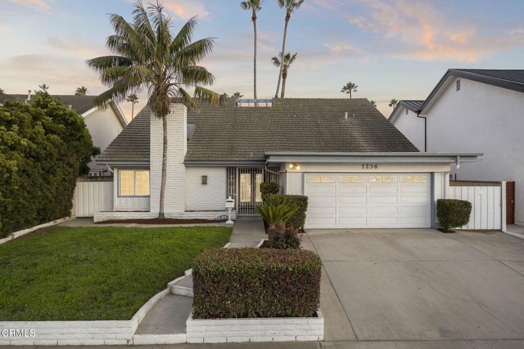 **Coastal Retreat in The VENTURA KEYS!** Discover the perfect blend of space, light, and location in this expansive 5-bedroom, 3-bathroom home on one of the most coveted streets in THE KEYS. As you enter, you are welcomed by a stunning central atrium that is the heart of the home, allowing sunlight to flow throughout the first floor and truly bringing the outdoors in.The main level is designed for comfortable living and entertaining. A formal living room boasts soaring ceilings and a statement fireplace, while a separate den provides the perfect space for a home office. The open-concept kitchen and family room flow seamlessly to the spacious backyard through large sliding glass doors, creating an ideal indoor-outdoor living experience. This generous layout provides the perfect canvas for this wonderfully reimagined home.Functionality and space abound with a highly desirable downstairs suite, featuring two bedrooms and two full bathrooms--ideal for guests or single-level living. Upstairs, a large, versatile loft offers a fantastic bonus space for a game room or art studio, accompanied by two additional bedrooms, a third full bathroom, and ample storage.Situated on a friendly, close-knit street, this home offers exclusive access to the best of coastal living. Homeowners have the opportunity to become members of the Ventura Keys Association for $250 annually, unlocking access to two private beaches, play equipment, and sports courts. Beyond the immediate neighborhood, you're conveniently located just moments from local shopping, dining, and easy access to the 101 Freeway. This ideal position places you perfectly between Malibu and Santa Barbara, with both destinations a mere 30 minutes in either direction. This home is ready for you to start making memories!