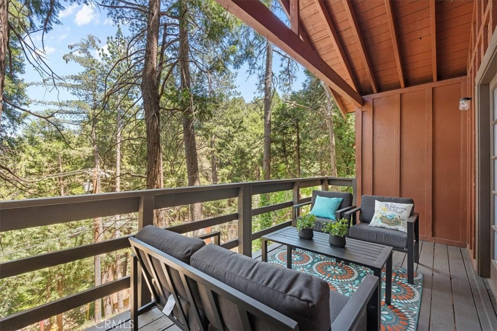**WELCOME TO THE BIRD HOUSE! Charming Mountain Retreat with Stunning Views in Crestline**
Step into your own serene and cozy escape in the heart of the Crestline mountains. This charming multi-level home offers comfort, character, and breathtaking views—perfect as a full-time residence, vacation getaway, or investment property.
The first level welcomes you with a private bedroom and convenient access to the basement. Upstairs, you'll find a bright and open living space featuring a second bedroom, a beautifully remodeled bathroom, a well-equipped kitchen with newer stainless steel appliances, and a warm, inviting living room centered around a wood-burning stove. Step out onto the balcony and take in the sweeping mountain views—an ideal spot for morning coffee or sunset relaxation.
Set on a large, private lot surrounded by towering trees, this home includes its own walking trails—perfect for enjoying the fresh forest air, peaceful nature strolls, or morning meditation. A spacious deck provides additional space to unwind or entertain while taking in the beauty of the outdoors. Ceiling fans throughout the home provide comfort year-round, and the wood stove adds a cozy touch for crisp mountain evenings.
Located just minutes from Lake Gregory and the heart of town, you’ll enjoy easy access to local shopping, dining, and year-round recreation. From hiking, fishing, swimming, and paddle boarding in the warmer months to skiing and snowboarding in the winter, Crestline is a four-season destination. Don’t miss community favorites like Jubilee Days, the 4th of July parade, and weekly farmers markets with live music.
Whether you're seeking a peaceful retreat or an exciting investment, this mountain gem truly checks all the boxes—including front-row seats to the Fourth of July fireworks over Lake Gregory!