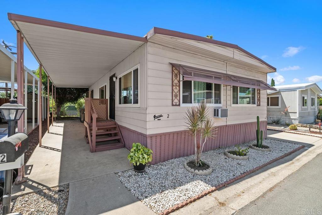 Discover the charm and potential of this spacious 1973 mobile home featuring 2 bedrooms, 2 bathrooms, and an exceptionally large living room that provides plenty of space for both relaxation and entertaining. The thoughtful floor plan includes a dedicated dining area for gatherings and a convenient laundry cabinet tucked neatly away for everyday ease. This home offers classic character with the opportunity to make it your own through updates and personal touches. This property delivers a welcoming layout and excellent functionality at an affordable price. The community offers plenty of opportunities to connect and stay active. Challenge neighbors in the billiards room, explore your next great read in the library, or host gatherings at the outdoor BBQ area. For added convenience, there’s even a DIY car wash station and a dedicated pet park where four-legged friends can play. At the heart of it all is a modern recreation room, thoughtfully designed as a hub for events, hobbies, and social activities. Whether you’re looking for quiet relaxation or a lively sense of community, this park has something for everyone. Don’t miss your chance to create the home you’ve envisioned in a well-designed space with all the essentials already in place!