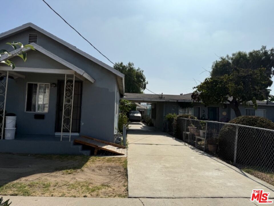 Ask about one unit potentially vacant. Two houses on an 8007 sq ft LAR2 lot. Ideal for development. This area is undergoing a lot of transformation. Buy for investment, live in one, convert the garage to an ADU, or tear down and develop the lot. Buyer to satisfy themselves regarding zoning, rent control, etc. Buyer to cooperate with Seller's 1031 exchange at no additional cost or liability to Buyer. Expenses are estimated.