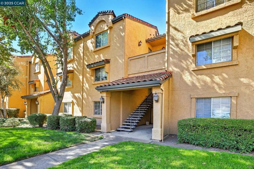 Location, location,highly sought after ground floor one level unit in the gated community of Sienna Hills.  New carpet and paint, laminate flooring in living areas, Granite counters and backsplash in kitchen w/ white cabinetry, laundry room with washer and dryer off of kitchen, generous covered patio with extra storage closet off of main living area with views of hills and beautiful sunsets.  Enjoy the serenity of this premium well cared for community with two remodeled pools, three jetted spas, fitness center, sauna and two elegant Clubhouses. Water included in HOA dues. Walk to Club Sport, Canyon Lakes Golf Course,restaurants and shops.  No rental restrictions make this a great choice for buyers and investors.  Award winning San Ramon Valley schools. Additionally this unit has nine visitor parking spaces close by for the convenience of your guests.