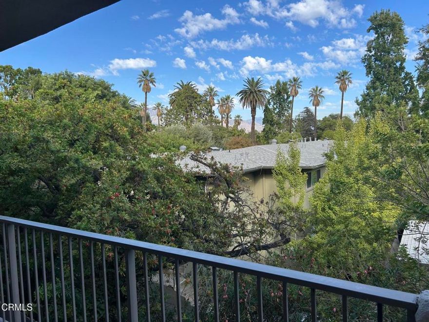 Spacious, one bedroom near Orange Grove Boulevard's Millionaire's Row. This immaculately maintained condominium complex is near everything special about Pasadena: Old Town, the Gold Line Metro, Singer Park, Huntington Hospital and the Arroyo. Far back from the street for added quiet, on the east side for morning light, walk upstairs or take the elevator to the unit's distinguished double front doors and enter a light-filled open floor plan. The bright kitchen has new recessed lights, a new fridge, Amana Master Clean 5000 dishwasher, Frigidaire gas double oven, Kenmore gas stove top, Magic Chef counter top microwave and plenty of wood cabinets. The tile floor is new. The dining area has a modern ceiling light. There's a large, private balcony offering views of the San Gabriel Mountains and Singer Park. The bedroom has plenty of natural light, new blinds on the windows, wall-to-wall closet and a large full bathroom  with shower over bath, new tile floor and linen closets. There's a 3/4 bathroom off the hallway with new tile floor. There's new wall-to-wall carpet throughout, and the interior has just been painted. The complex offers a laundry room, heated swimming pool, recreation room with pool table, outdoor grill and picnic area and secure parking. The unit has two tandem parking spaces. There's copper plumbing, professionally landscaped grounds with newer lights and updated lobby.