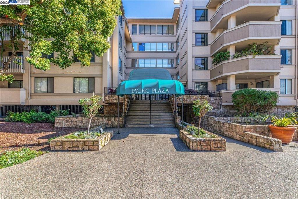 WELCOME HOME! A sweet, comfortable home or a great investment! Come see this wonderful layout in this corner unit with the large, wraparound patio. This lovely 2 bedroom, 2 full bathrooms condo has a dining room, fireplace in the living room, and stackable washer/dryer in unit. Conveniently located near shops and restaurants, and Farmers' Market through the summer! Close to BART and vibrant downtown!