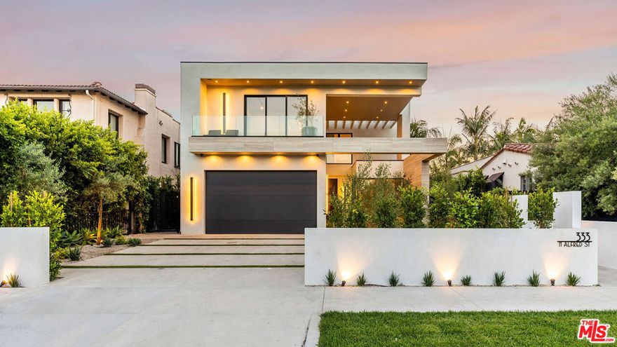 Brand New!  3 Story Home!  5 Bed + A.D.U.  Elevator + 3rd Floor Entertainment Space + Movie Theatre + Rooftop Deck + Pool!  Welcome to The Alfred!  A Luxurious Modern Masterpiece built on the most sought-after streets in West Hollywood & Beverly Grove! This stunning & sophisticated home perfectly balances indoor & outdoor living with an open-layout concept that was curated to be the best floor plan of any modern home on the market.  Situated behind privacy gates & immaculate landscaping, enter this home via a glass pivot door and be greeted by an open-concept lavish formal living & dining rooms.  The home boasts an opulent dining room alongside a custom designed Italian-imported Kitchen complete with porcelain countertop, dark wood veneer panels, PITT cooktop & a full-set Miele appliances. Enjoy the family room where custom insulated glass sliding doors provide a remarkable view of the backyard & pool. Ascend the stairs to the double-size master suite that showcases a private patio, fireplace & balcony. Indulge in the stand-alone tub and the elegant walk-in closet complete with imported Italian finishes. At night, take the elevator to the penthouse indoor-entertainment space where you can entertain friends at the bar area, watch a movie at the 3rd Floor Movie Theatre and enjoy the 360 degree view of LA from the rooftop deck.  In the rear of the property, an adaptable Additional Dwelling Unit (ADU) can serve as a home for guests, an office or as an extra outdoor entertainment space. This smart home is secured by double-gates, equipped with Control 4 technology and has encompassing video cameras. We are excited to show you the lifestyle the home has to offer!