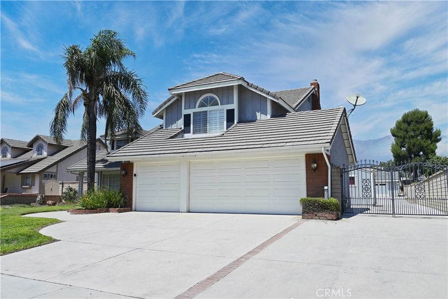 2 House on a 19,600 sq ft lot! No HOA, No Mello-Roos. Ideal for multi-generational living or live one and rent one out. Exceptional multi-dwelling estate. 1,200 sq ft 2025 built Double entrance door ADU with 10 ft ceiling, 3 bedrooms, 2 bath, modern European cabinetry, panorama windows, pay-off Tesla solar panels, EV charger outlet and 2 car extra size garage. Whether used for rental income, in-laws, guests, or a home office, this space offers endless possibilities. Main house has 4 bedrooms and 3 baths and 2,579 square feet of living area, a cement tile roof and a 3-car garage. 1 bedroom and 1 bathroom downstairs. The entry opens to the formal living room and separate dining room with vaulted ceiling. The kitchen offers ample cabinet and counter space plus eat-in kitchen area. The family room is open to kitchen and features a cozy fireplace. There is a separate laundry room downstairs with upper storage cabinets. Upstairs you will find the primary bedroom with double closets and ensuite bath with separate tub and shower. The third and fourth bedrooms share a hall bath with double basins and tub-shower combination. There is patio sunroom on the rear of the house. Block walled rear yard features an in-ground pool and spa and lattice covered patio with brick accents. The lot is cross fenced with two storage sheds on site plus gated RV Parking! 2 houses have its own individual electrician meter and house number. Rare opportunity to own a truly multi-functional and luxurious compound in prime Rancho Cucamonga!