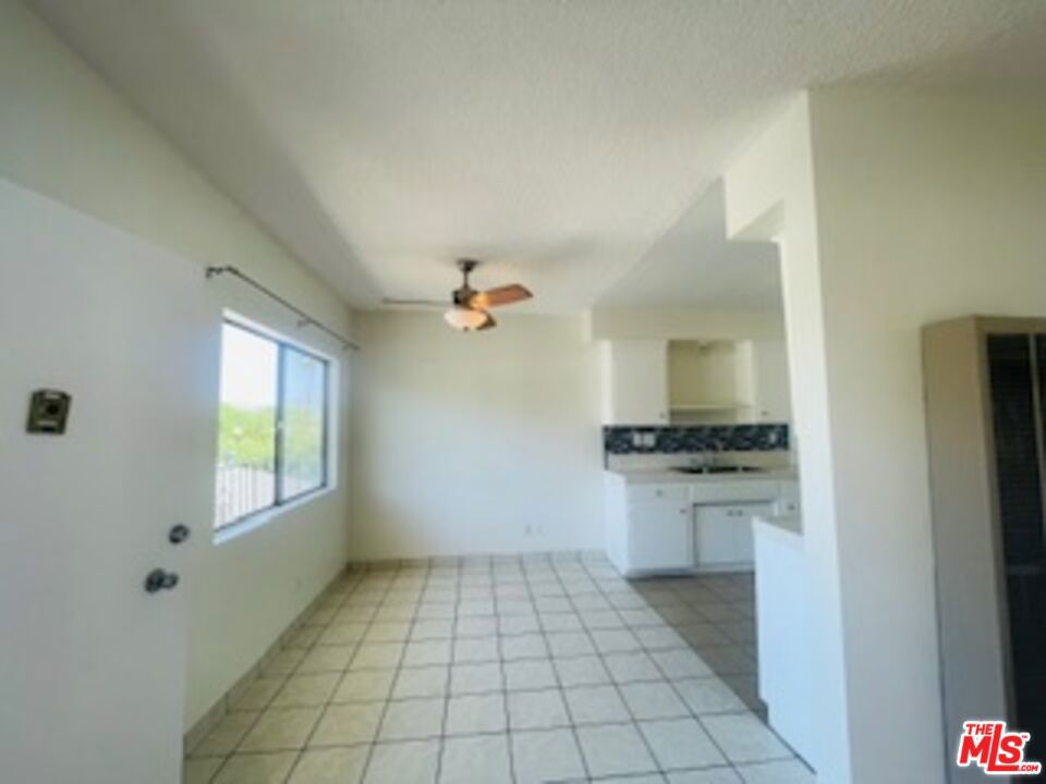 This is bright and spacious home features; An open living and dining layout, perfect for entertaining Updated kitchen with modern finishes Teo well-sized bedroom offering comfortand privacy Convenientin -unit amenities plus garage parking .Located just moment fron Santa Monica Blvd, This home places you near trendy restaurants, cafes, shopping, and nightlife, while still providing a quiet neighborhood feel .
