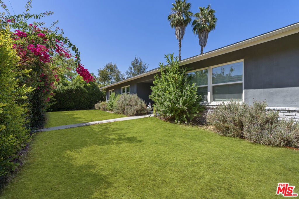 Photo of 5636 Valley Circle Boulevard, Los Angeles, CA 91367 (MLS # 26864635)
