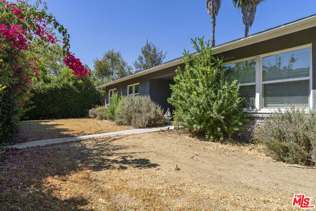 Photo of 5636 Valley Circle Boulevard, Los Angeles, CA 91367 (MLS # 26864635)