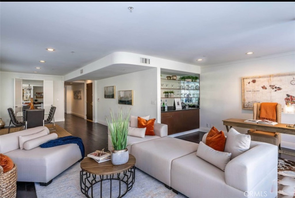 Located in a prime Westside location, this light-filled 2nd-floor condo offers spacious open living with hardwood floors, multiple balconies, and a secure building. The chef’s kitchen features Viking appliances, granite countertops, and custom banquet seating. The primary suite includes a walk-in closet and spa-like bath, while the second bedroom also has its own en-suite bath and ample storage. With in-unit laundry and walking distance to Century City, this home blends comfort, style, and convenience in one of LA’s most desirable neighborhoods.