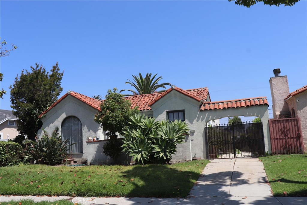 Charming Spanish Home! Welcome home to this 3-Bedroom, 1 bathroom. Home has been remodeled with new flooring, new quartz kitchen counter tops, and new cabinets, remodeled bathroom ,new paint. Roof is 1 year old. Living room opens up to dining area, perfect for family gatherings. Laundry area adjoins the kitchen. Outside, you will have plenty of space to build an ADU for extra income or extended family. Also features, Fig Tree and Orange tree. Conveniently located minutes away from Sofi Stadium, Intuit Dome, The Forum, Hollywood Park Casino, LAX, Metro Station and so much more.