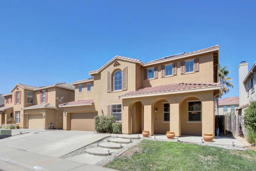 Welcome to this spacious 4-bedroom, 3-bathroom home located within the Elk Grove Unified School District, this home is perfect for families seeking a spacious and comfortable living environment.  Home offers a perfect blend of comfort and functionality. The well-appointed kitchen is a chef's delight, featuring an oven range with gas, dishwasher, microwave, refrigerator, and a convenient pantry. The separate family room and formal dining area provide ample space for entertaining guests. The home is equipped with modern amenities including central air conditioning and heating for year-round comfort, and energy-efficient features like double windows, Energy Star appliances, and solar power. The flooring is a mix of carpet and tile, providing warmth and style throughout the home. Enjoy cozy evenings by the fireplace and the convenience of an in-utility room laundry equipped with a washer and dryer.