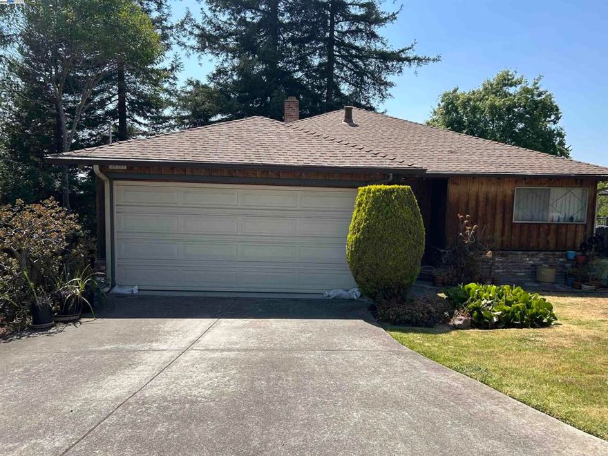 OPEN SUNDAY JUNE 8th 1-4  Great fixer-upper in the Proctor School neighborhood and award winning Castro Valley school district. Make this 5 bedroom, 2 bath, 2 car garage, 2136 sq ft home your own.  Tons of potential for this two story property with partial bay views on a private street.  Walk into the spacious living room with formal dining area that leads to the backyard deck and views of Castro Valley. Downstairs has it's own separate entrance that leads to the family room with fireplace and three bedrooms. This is a probate sale with Independent Administration. Property sold "AS IS"