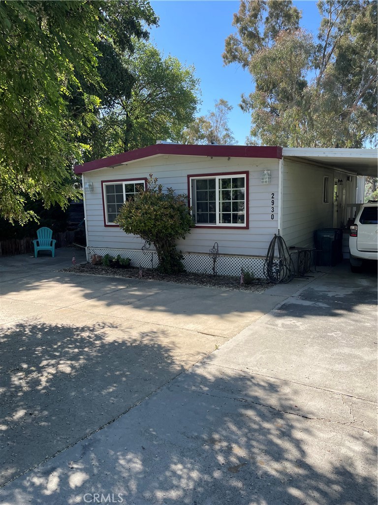 Located on a quiet cul de sac, this home had some updating done a few years ago. Has hardi plank cement siding, newer vinyl windows & Appliances. Needs some tlc to make it your perfect retreat at the Lake. Seller stated an " as Is " sale. Carport offers shade for storing your boat & Plenty of concrete parking on level lot. Prior Title report says permanent foundation,