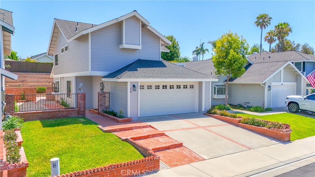 Welcome to 16 Oxbow Creek Lane – a Renovated Charm in the Heart of Laguna Hills. Offering 3 bedrooms, 2.5 baths and sitting on a spacious 5,400 sq ft lot in a quiet, pride-of-ownership neighborhood. 16 Oxbow is hitting the market after being updated and renovated throughout. As you arrive, you're greeted by a beautifully landscaped front yard and a large side yard that adds to the home's outstanding curb appeal. Step inside to a light-filled living room featuring soaring vaulted ceilings to your left, while to your right you'll find a flexible den/office space (which can easily be converted into a 4th bedroom). Throughout the home, you have recessed lighting and brand new Luxury Vinyl Plank floors that add warmth, style, durability and ties each space together with a clean, cohesive look. Continue down the hall to access the attached 2-car garage and a stylishly updated half bath. To the left of the entry, the updated kitchen overlooking the side and rear yard offers abundant light, granite countertops, a new range and its own informal dining area, as well as a separate formal dining room ideal for hosting family and friends. You have three generously sized bedrooms upstairs, including a spacious primary suite with its own private patio, large dual closets, and a renovated en suite bath. Two additional bedrooms share a second updated bathroom providing ample space for family, guests, or work-from-home setups. Nearly every detail has been thoughtfully upgraded, including new paint inside and out with modern baseboards. The expansive backyard offers a terraced garden area with endless potential, possibly even room for a pool and spa. Located near shopping, dining, parks, hiking trails and top-rated schools, this is the home you've been waiting for.