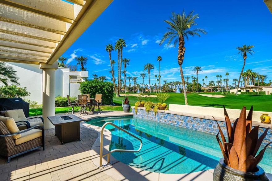 Discover the perfect desert retreat, a beautiful updated Pool Home showcasing stunning Fairway and Mountain Views. This popular Troon model features a spacious, bright open floor plan designed for easy living and entertaining. Meticulously upgraded with modern finishes--including new heat pumps, all-new Milgard windows and sliders, stylish lighting, automated blinds, and plush new carpeting to name a few--this home offers comfort and elegance. The well-thought-out layout includes a formal Living Room with a striking slate Fireplace, a Dining Area, and a cozy Family Room with a Wet Bar and Wine Frig. The Chef's Kitchen boasts a large butcher block Island, custom Cabinetry, Quartz Counters, and Stainless Steel Appliances, all looking out to the picturesque Views. The Primary Suite provides a private sanctuary, a walk-in closet, a Spa tub, and a walk-in Shower. The spacious 2nd Suite features an en-suite bath, and walk-in closet. The versatile 3rd Guest Room includes a Murphy bed and office desk, perfect for Guests or working from home. Step outside to the expansive entertaining Patio with a Private Pool. Additional highlights include a leased solar system, upgraded insulation for energy efficiency, and a spacious 3 car air-conditioned garage complete the home. Imagine cocktails on the Patio as you marvel over the captivating Mountain Vistas, the 8th Fairway and Green- your picture-perfect lifestyle at this premiere Indian Wells location. Offered partially furnished.