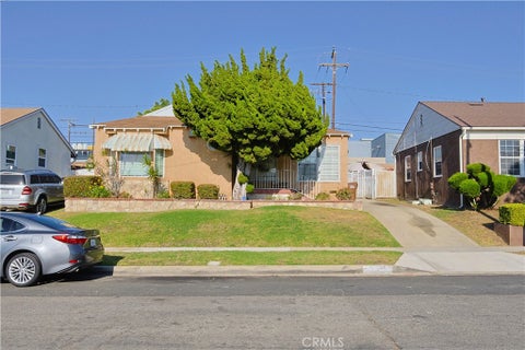 Photo of 11516 S St Andrews PL, Los Angeles, CA 90047 (MLS # SB26174116)