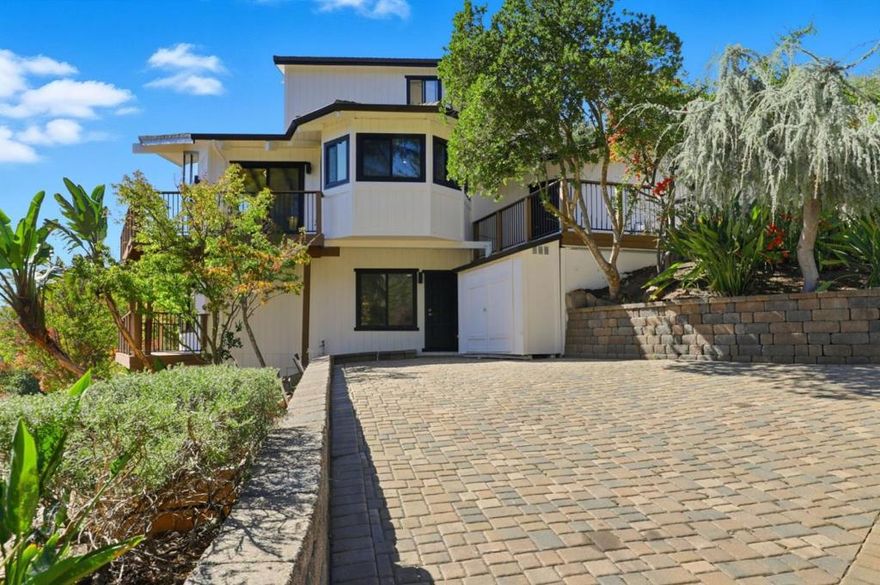 Experience the perfect blend of luxury, comfort, and nature in this stunningly fully updated home tucked in the serene hills of Morgan Hills sought-after Jackson Oaks community. Every inch of this residence has been beautifully reimagined from its sleek new interiors to the thoughtfully designed outdoor living spaces that capture panoramic views. The open-concept floor plan, lots of natural light coming through, features 3 spacious bedrooms, 3.5 bathrooms, and a large loft ideal for a home office or guest space. The downstairs junior suite offers a private entrance and its own driveway, perfect for multigenerational living or extended guests. The designer kitchen showcases high-end finishes, quartz counters, an expansive island, and premium stainless steel appliances and soaring ceilings. Step outside onto your multi-level Trex wraparound deck, where you can enjoy morning coffee above the trees or sunset dinners. The 1.54-acre lot offers two driveways, usable outdoor space, and privacy. Located just minutes from downtown Morgan Hills shops and restaurants, top-rated schools, and freeway access  this home delivers the best of both worlds: tranquil country living with modern sophistication in desirable Jackson Oaks community with access to a private pool and clubhouse.