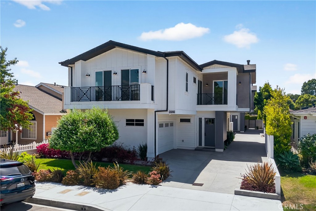 Welcome home to this stunning, detached townhome built in 2022! Upon entering, you'll be greeted with soaring ceilings, tons of natural light, and beautiful hardwood floors. An open floor plan features a spacious living room with fireplace, wet bar with wine fridge, dining area big enough for entertaining, powder room for guests, and a Chef's kitchen with an eye-catching island. Some of the highlights of the kitchen are a Wolf 6-burner gas range and hood, Bosch fridge, and convenient pantry. A private south-facing backyard space is perfect for dining al fresco or hosting a barbecue. Upstairs, you'll find an additional den space great for a reading nook or play space, two balconies, washer and dryer, and all 4 bedrooms. The primary suite features vaulted ceilings, a fireplace, and balcony access. The primary bath is a true spa-like retreat with dual vanities, skylight, large shower, and soaking tub. There is an additional bedroom with en suite bath on this level, as well as a guest bath for the other two bedrooms to share. But that's not all! This home has all the bells and whistles - OWNED solar providing incredible electricity savings, a 5-speaker sound system with music receiver, window treatments with remote control and programming capability, LED lighting, Doorbird front door video system, 5 camera security system, central vac, tankless water heater, automated irrigation system, an epoxy-floored 2 car garage with remotely controlled garage door convenient for deliveries when not at home, pre-wiring for an EV charger, and thoughtful storage spaces and excellent floorplan functionality throughout. A quiet street away from busy roads with a stellar location just one block from Anderson Park and fantastic Lincoln Elementary, 4 minutes from the 405 freeway, and only 2.5 miles from downtown Manhattan Beach. Top rated schools and the irresistible South Bay lifestyle await - what are you waiting for? Come and see this better-than-new-construction home and find the special one for which you've been searching!