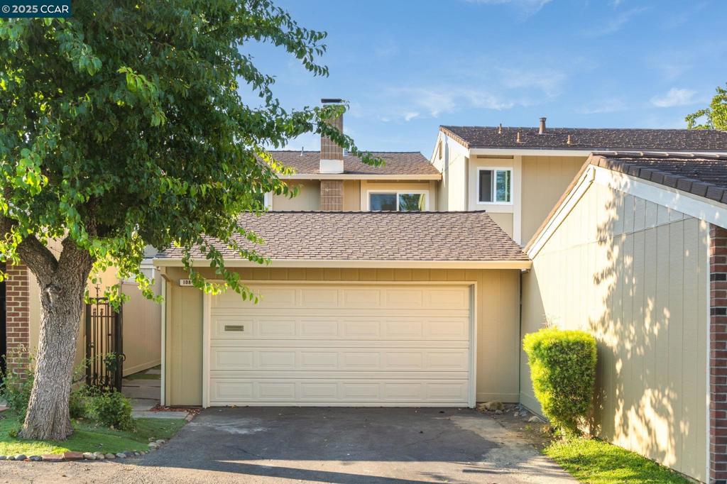 Enjoy breathtaking panoramic views from this beautifully updated 3BD/2.5BA home in the desirable Heather Hills community. Designed for comfort and style, it features a private courtyard, scenic unobstructed views, and an inviting layout ideal for daily living and entertaining. The bright living room features recessed lighting and a freshly painted wood-burning fireplace. The dining area with beautiful views flows into the refreshed kitchen and opens to a spacious rear deck with stunning panoramic views, perfect for relaxing or entertaining outdoors. Upstairs includes two generous bedrooms, an updated full bath, and a spacious primary suite with a remodeled en-suite and plantation shutters. Additional improvements include a newer roof and gutters, updated upstairs windows, and recent exterior painting—including both front and back decks. A 2-car garage offers ample parking and storage. This thoughtfully maintained home offers tasteful updates, energy-efficient enhancements, and a peaceful lifestyle in a well-kept community. A must-see!