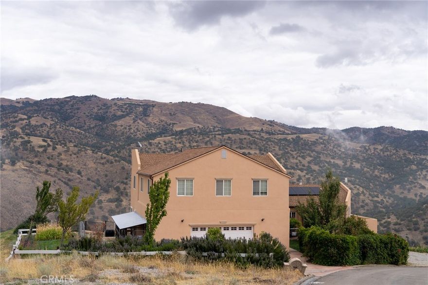 Properly located in the exclusive Oak knolls of Tehachapi, this commanding 3-level Spanish-Style estate offers space, versatility and timeless charm. Enter on the main level into a bright living room and great room that flow into a stylish kitchen with granite counters, a new microwave and dishwasher. A cozy patio, perfect for BBQ's or morning coffee. The main level also includes a laundry room, 3/4 bath, and a spacious primary suite with spa tub, separate shower, and private patio. Upstairs features two bedrooms, a loft, an additional primary suite or game/bonus room and a hall bath. The lower level offers just under 1,800 sqft. with kitchen, 2 bedrooms, laundry, 2 bonus rooms, and private entrance with parking. Ideal for extended family or rental potential of $1,500+ a month. This home truly has room for everyone! The home also features a brand new tankless water heater, full home generator, newly installed leach lines for the septic system, 8.58kw Solar System that will be paid-off at the close of sale. Pool table, equipment and light fixture are included in sale. County Assessor Record state home is 4 bedrooms 3 baths and 2,524 sqft. Buyer to do their own due diligence & verify all facts contained in MLS. MLS is deemed reliable, but often may NOT be accurate. Don't miss out on this amazing opportunity to own in Tehachapi!