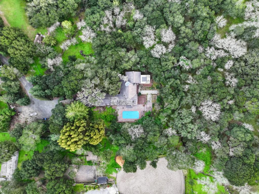 Bring your builder and architect!! First time on the market in 50 years - incredible value, priced to sell. Four beds and 4 baths in original ranch home plus more recent addition and ADU above garage. Beautiful in ground pool. Horses allowable and close to Woodside trails. Almost three acres!!!! Close to all Central Woodside has to offer including highly desirable Woodside elementary school.