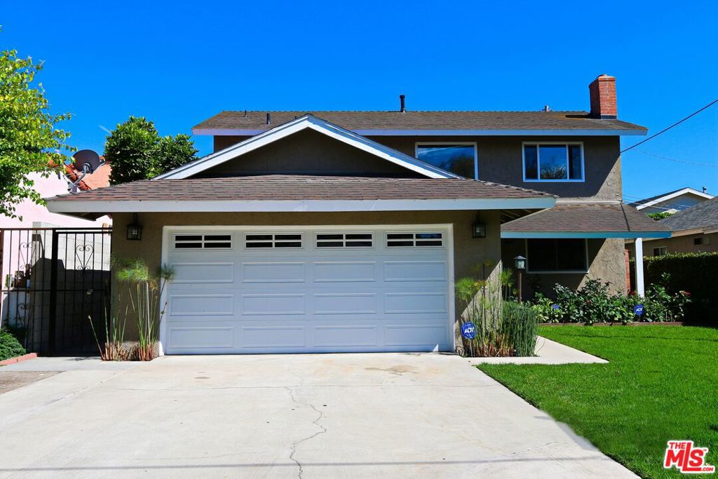 We invite you home to this light and bright 5 bedroom, 2 bathroom home located in the highly sought after Culver City neighborhood with easy access to the popular 405 and 90 freeways. Spread out in this 2-story, 1,650 square foot home with a fully renovated, open-concept kitchen overlooking the spacious backyard. 1 bedroom is located on the main level along with a fully renovated bathroom featuring an oversized custom tile shower. Retreat upstairs where 4 additional bedrooms are located and another fully renovated bathroom with double vanity and tile shower. Enjoy relaxation in the spacious living room in front of the wood burning fireplace or opt for fresh air in the beautifully landscaped and fenced backyard. Additional features include an oversized two-car garage with washer and dryer, hardwood floors throughout, ample closet storage, central heat and plenty of natural light throughout.
