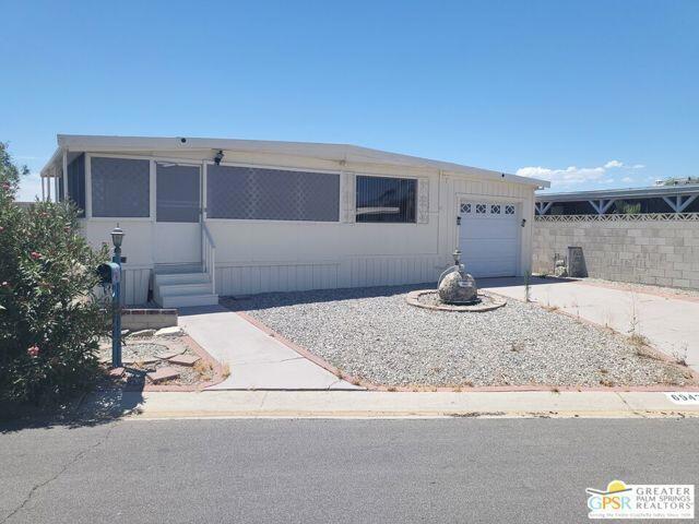 DESERT CREST COUNTRY CLUB IS A 55+ COMMUNITY, SO YOU MUST BE AT LEAST 55+ TO RENT HERE. Very nice and easy to maintain, this Two Bedroom and One bath 1094 square foot manufactured home lease includes a large, enclosed garage with its own laundry room with extra sink and commode. Newer items through the home include laminate flooring, cabinets, cook top, dishwasher, sink, and quartz countertops. The washer and dryer are included in the rent (owner will not maintain or replace). Come and make this your own special Desert retreat! A newly Remodeled kitchen with new cabinets, Gas CookTop, Wall Oven, Stainless Steel Sink, and Dishwasher. White Quartz countertops for elegance! Roomy dining area for entertainment too. Lots of choices for cooling with Central Air, Swamp Cooler & additional wall unit. Recently Painted the Whole House Interior & Exterior! Easy to clean laminate flooring. The attached Tandem Garage has a newer Garage Door and automatic opener. Secondary half bath with vanity and commode in the laundry room. The Rear yard is fenced with a block wall. Luxuriate in the heated natural mineral hot springs water Pool and the three mineral water Spas. Golfers enjoy a 9 hole, 3 par golf course with beautiful water features and panoramic views of Mounts San Jacinto and San Gorgonio along with the Western Coachella Valley. The Clubhouse has many amenities such as a Game Room, Library, Gym and indoor shuffleboard courts. Back at home, relax on the oversized screened porch and enjoy the Mountain Views. Low maintenance water conserving rock hardships. Desert Crest Country Club features a nine-hole Par 3 Golf Course, a clubhouse for social gatherings, and mineral water pool and spas. The community is large and well-established with over 560 homes. Only minutes from Palm Springs International Airport, and all the restaurants and shops in downtown Palm Springs. Landlord is looking for a long-term renter who will enjoy this well maintained home.