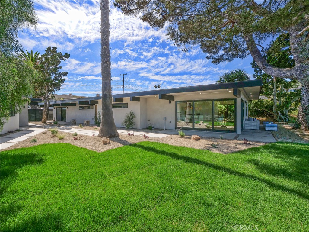 Beautifully remodeled home overlooking the Blue Pacific and city lights of San Pedro and Long Beach. In addition to the main home, there is a new Additional Dwelling Unit, that can be for family members or a rental. The ADU is approximately 550 square feet. (Buyer to verify) With all new appliances. Step inside the main home and view the completely remodeled kitchen with custom cabinetry, spacious center island with a quartz top.
The appliances are top of the line, including a Forno refrigerator, a six-burner gas stove, and a Bosch dishwasher. The main home has a master bedroom and an additional room that can be used as a bedroom or office. There is an abundance
of storage space.
Located a short distance from Dean Danna Friendship Park which offers hiking, walking, dog walking or just enjoying the views of Catalina Island, the city, and the shoreline.
Minutes from elementary and intermediate schools, fine dining, and shopping. A 5-to-10-minute ride to the harbor freeway and the new Harbor West development (currently under construction).