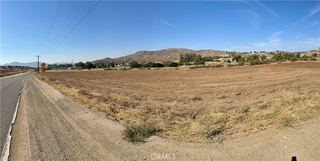 This lot has many potential uses; build, place a home, subdivide. It is a corner lot off of paved roads. Electric right at the property line and homes and utilities nearby.