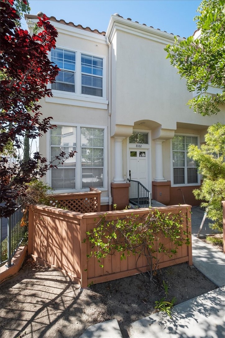 Welcome to the largest floor plan available in the highly sought-after, quiet, and gated Summit Renaissance Community. This end-unit townhome has been thoughtfully upgraded throughout, offering both style and functionality.
Step inside through a smart front door lock into a bright and open main living area featuring luxury vinyl plank flooring, 5-inch baseboards, fresh paint, and a stunning remodeled dual-sided fireplace. The layout seamlessly connects the den, dining area, family room, and kitchen—ideal for modern living and entertaining.
The remodeled kitchen showcases a sleek waterfall-edge quartz countertop, a full subway tile backsplash, and stainless steel appliances. Custom-finished cabinetry includes matte black hardware and soft-close mechanisms, complemented by a large farmhouse sink for both beauty and utility.
Just off the kitchen is a stylishly upgraded half-bathroom and direct access to the attached two-car garage. A whole-home water filtration system ensures clean, treated water throughout every tap in the house—perfect for healthy living, soft water, and peace of mind.
Upstairs, you’ll find a completely carpet-free second level. The expansive primary suite is a standout, featuring both a walk-in and sliding closet, and a beautifully remodeled en-suite bathroom. The upgraded shower features sleek tile work, modern black fixtures, and a seamless glass enclosure. Dual sinks are set in an expansive quartz slab, complemented by elegant ceramic tile flooring and coordinated cabinetry.
Two additional bedrooms share a convenient Jack-and-Jill bathroom, ideal for families or guests.
Located within the prestigious Anaheim Hills school district and nestled in a peaceful, gated community, this smart, clean, and sophisticated home offers upscale living in one of Orange County’s most desirable neighborhoods.