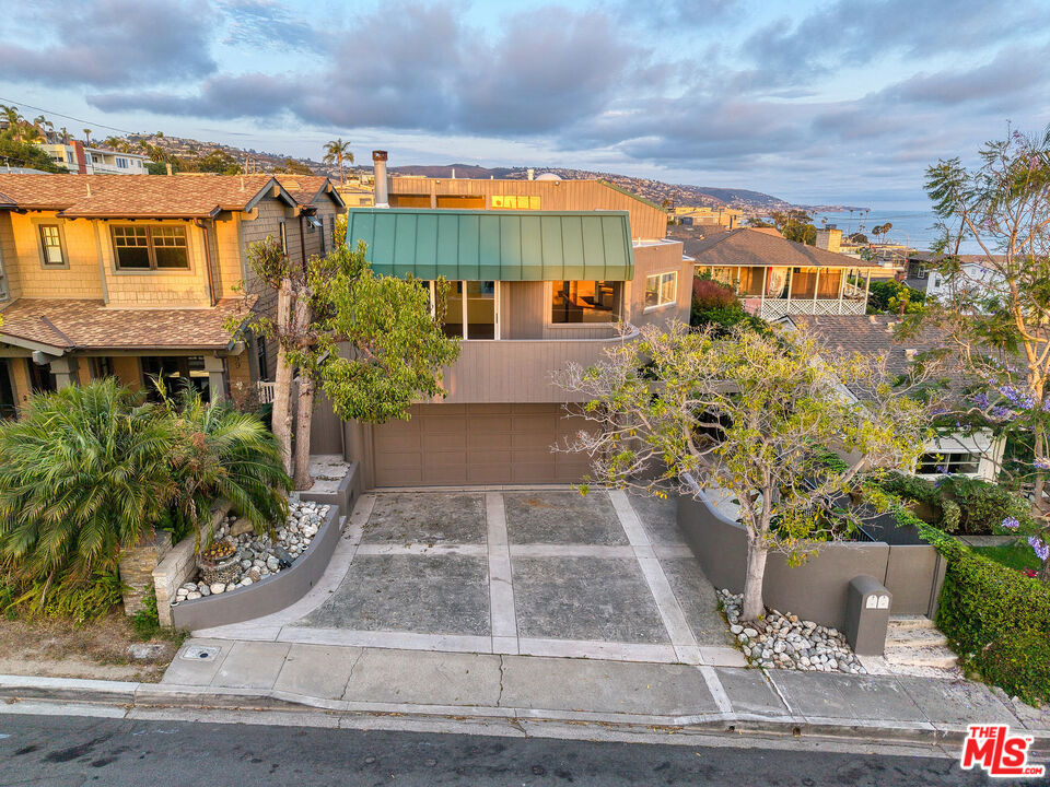 Stunning Ocean-View Vacant Duplex in Prime North Laguna Beach! Incredible opportunity to own a beautifully maintained, fully vacant duplex with sweeping ocean views in North Laguna Beach. Both units offer 2 bedrooms and 2 bathrooms with high ceilings, skylights, and seamless indoor-outdoor flow through private balconies and patios. The front unit, recently updated and ideal as an owner's unit, features a bright living room with full-width sliding doors that open to a spacious ocean-view balcony. The kitchen offers scenic ocean views, while the downstairs primary suite opens to a private patio. Upstairs, a second bedroom includes its own balcony with panoramic ocean vistas. The back unit offers a similar layout with a large great room and private ocean-view balcony perfect for entertaining or quiet relaxation. Each unit includes its own direct-access 2-car garage with generous storage and in-unit laundry. The property is fully vacant ready for immediate move-in, leasing, or owner-occupancy with income potential. Enjoy the best of coastal living with walkable access to beaches, shops, restaurants, and world-class hiking trails.