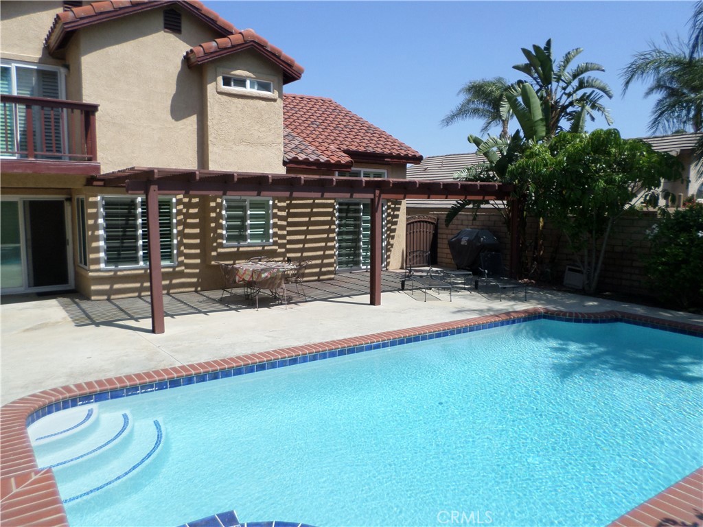 Immaculate and stunning 3 bdr. 2.5 ba. pool home near the 210 Fwy, within 10 minutes to high score school (Los Osos High School 9/10 rating), Upgrades and features abound in this exceptional home, including rich granite counters, new maple cabinetry, kitchen island, stainless steel appliances, hardwood flooring, and travertine tile. Other highlights include remodeled baths with granite and quartz counters, newer dual-pane windows, classic plantation shutters, ceiling fans, as well as an energy-saving whole-house fan. There is also a new and the front yard is highlighted by a gated courtyard. A sparkling pool and spa are the centerpieces of a gorgeous backyard which is enclosed by block walls and also features beautiful planter walls with colorful flowers. This home is ready for your summer time move-in!