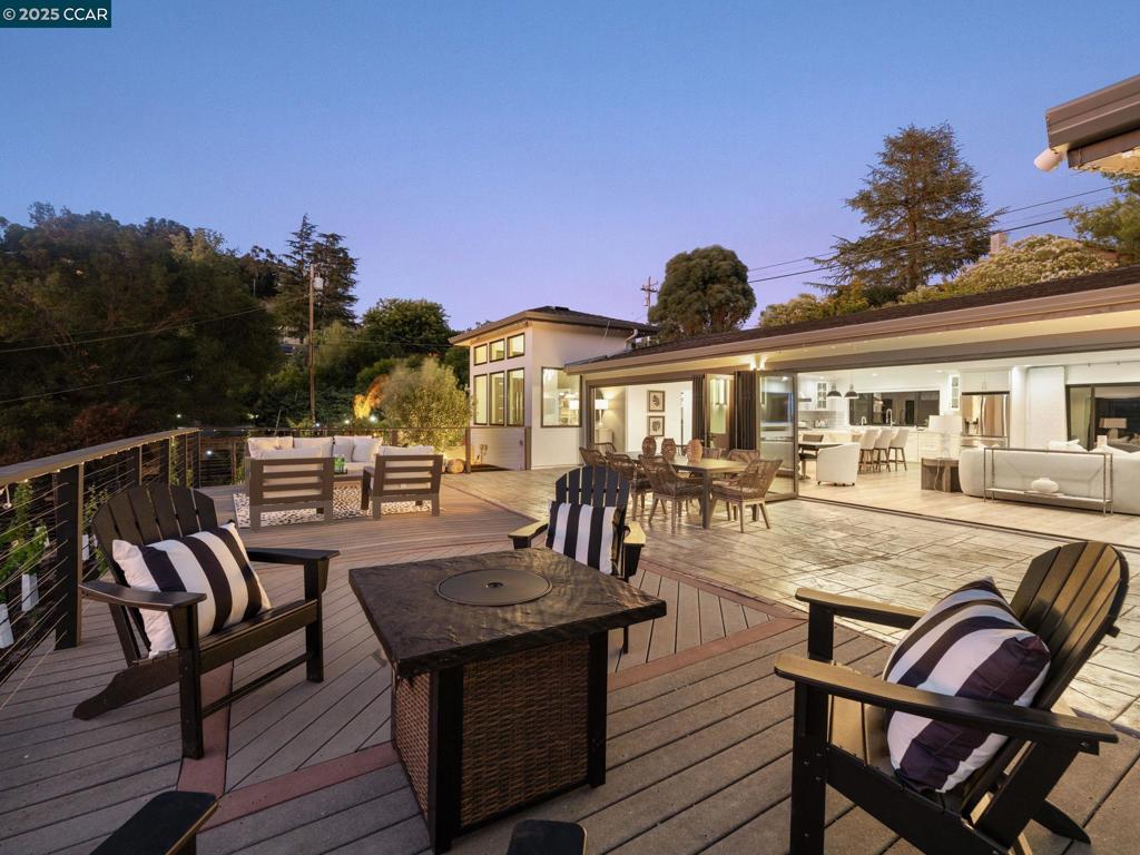 New construction. William Wood design optimizes multigenerational living, income-producing potential, sunset views, indr/outdr living. Westside Alamo ¾+ fully-fenced acres. 2 homes. 2412+/-SF 4 bds. 3 bths. 1200+/-SF 2 primary suites. 2.5 bths w/solar, chef’s kitchen, wine br, private deck. Main home: Panoramic walls of wndw & retractable screens open to 1100+/-SF trex deck/patio. Light-drenched contemporary design. Luxury vinyl flrs, high ceilings, recessed lights. Great rm. Frpl. Chef’s kitchen w/quartz counters, glass subway tile bksplsh, waterfall quartz island/brkfst br. Walk-in pantry. Z-Line range, pot filler, LG dw, microwave. Primary suite w/slider to deck, walk-in closet w/custom built-ins. En suite. Free-standing tub, dual-sink floating vanity, oversized shwr. Two bdrms w/sliding mirrored closet drs. Bth w/dual-sink vanity, shwr. 1 bd w/walk-in closet, nearby bth. Outdr entertaining mecca. Firepit. Bocce ball ct. Putting green. Olive trees. 2 potential pool sites. 6+car drvwy. 2-car garage fully insulated. Epoxy flr. 73 Cabernet grapevines. WiFi enabled irrigation, security, lighting, LED color-changing eave lights. Tankless wtr htr. Wine/beverage frigs. Indoor laundry, LG w/d. Nest thermostats. 2 mi to dwntwn WC, Alamo Plaza. Near Iron Horse Trail, top-rated schls.
