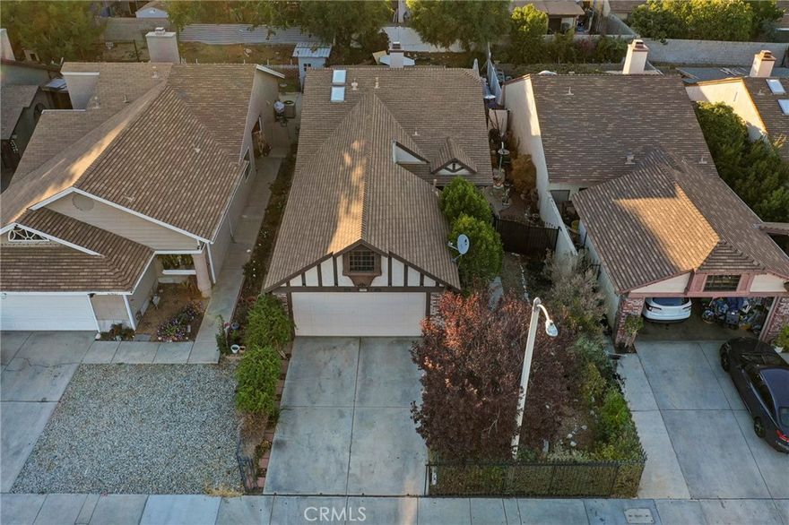 Beautifully maintained 3 bedroom, 2 bath home move in ready! The gourmet kitchen features granite countertops, stainless steel appliances with a 5-burner gas range and convection double oven, and alder wood cabinets with easy-close hinges. Recently upgraded wood-laminate flooring and new carpet flow through the living areas, which center on a cozy gas fireplace. The primary suite offers his & her wardrobe closets, and the backyard is a private oasis with covered patio, concrete and stone walkways, terraced plantings and mature landscaping. Come see it if this is the one for you!