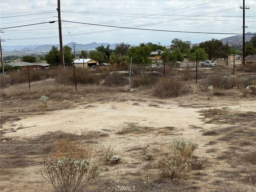 .75 Acres . There is a street light on this corner. Traffic has thousands of cars drive past every day. The lot next to this is also for sale, they can be sold together or separate . 326-250-042 is the corner and is .97 acres and is $350,000. Buy them both. Seller may finance with min 20% down. $550,000 If purchased together.
