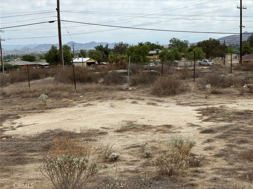 .75 Acres . There is a street light on this corner. Traffic has thousands of cars drive past every day. The lot next to this is also for sale, they can be sold together or separate . 326-250-042 is the corner and is .97 acres and is $350,000. Buy them both. Seller may finance with min 20% down. $550,000 If purchased together.