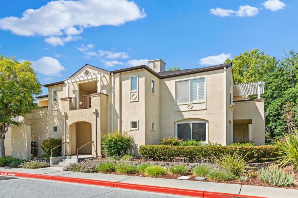 Stunning River Oaks Village Condo at the Crescendo- Modern Elegance Awaits! Discover your dream home in the heart of Silicon Valley! This gorgeous ground-floor corner unit, radiates bright, airy vibes w/brand-new updates that elevate every detail: Gleaming Oak LTV floors, fresh paint, sleek LED lighting & chic modern hardware create a sophisticated ambiance throughout. Step into the open-concept living area, where natural light pours in, seamlessly connecting the stylish modern kitchen & dining space perfect for entertaining or cozy nights in. The spacious primary suite offers a serene retreat, w/ double sink vanities, granite counters and LED lighting while the private patio showcases mature garden views w/lush fruit trees, blending tranquility & natural beauty. Located just minutes from tech giants like Broadcom, Nvidia, Intel, Google, Cisco, Micron & Cadence in addition to walking trails & nearby parks. Enjoy the convenience of an oversized attached garage w/extra storage, in-unit washer/dryer & ample guest parking. This quiet condo w/low HOA's is a rare gem in a coveted community w/its glistening blue pool & beautiful grounds for your daily walks. Experience modern living at its best! **Don't miss out this move-in-ready masterpiece wont last long!**Modern living at its best!