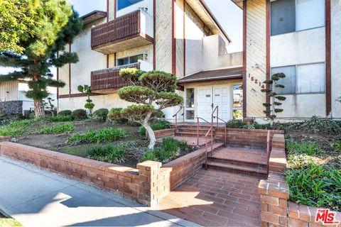 Photo of 15214 S Raymond Avenue #111, Gardena, CA 90247 (MLS # 25631753)