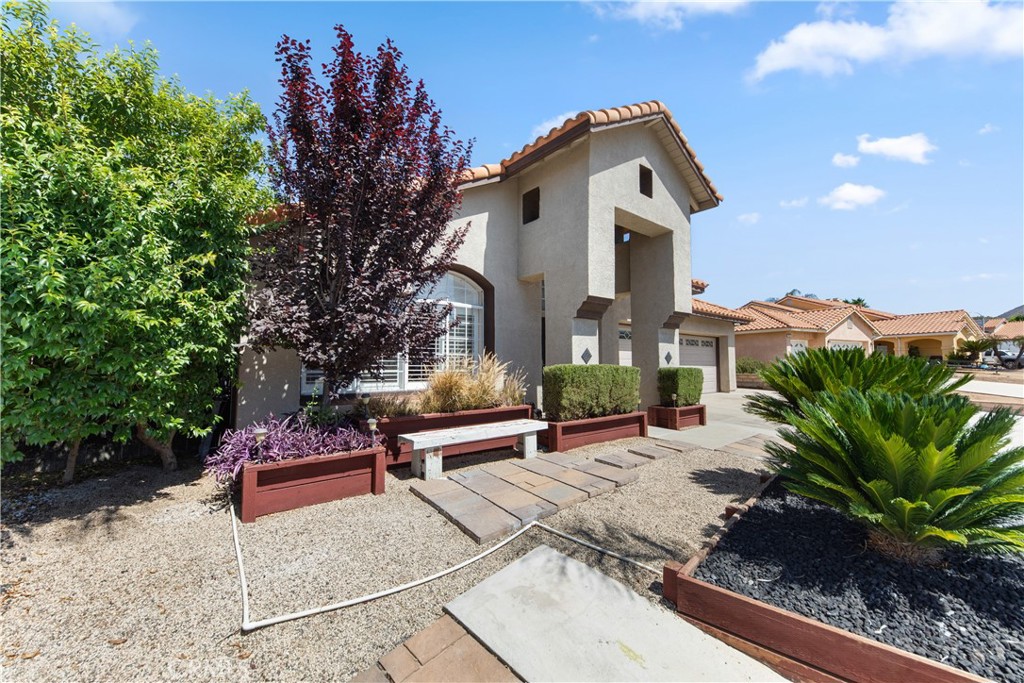 Welcome to your own slice of SoCal paradise! This spacious 4-bedroom, 2-bath single-story pool home sits on a generous 10,000+ sqft lot and was made for entertaining. Inside, you'll find beautiful hard flooring throughout, an open floor plan that connects the large kitchen to the family room, and light, airy tones that make the whole space feel bright and inviting. The bedrooms are generously sized, and updated cabinetry adds a clean, modern touch.
Step outside and you're instantly in vacation mode. The backyard is an entertainers dream, featuring a sparkling pool, multiple lounge areas, and shaded spots perfect for relaxing through those warm Wildomar summers. Whether its a weekend BBQ or a quiet evening by the pool, this home has the space and setup to make it happen. And with the freeway just minutes away, its easy to stay connected while enjoying your own private retreat. No HOA, and low tax!