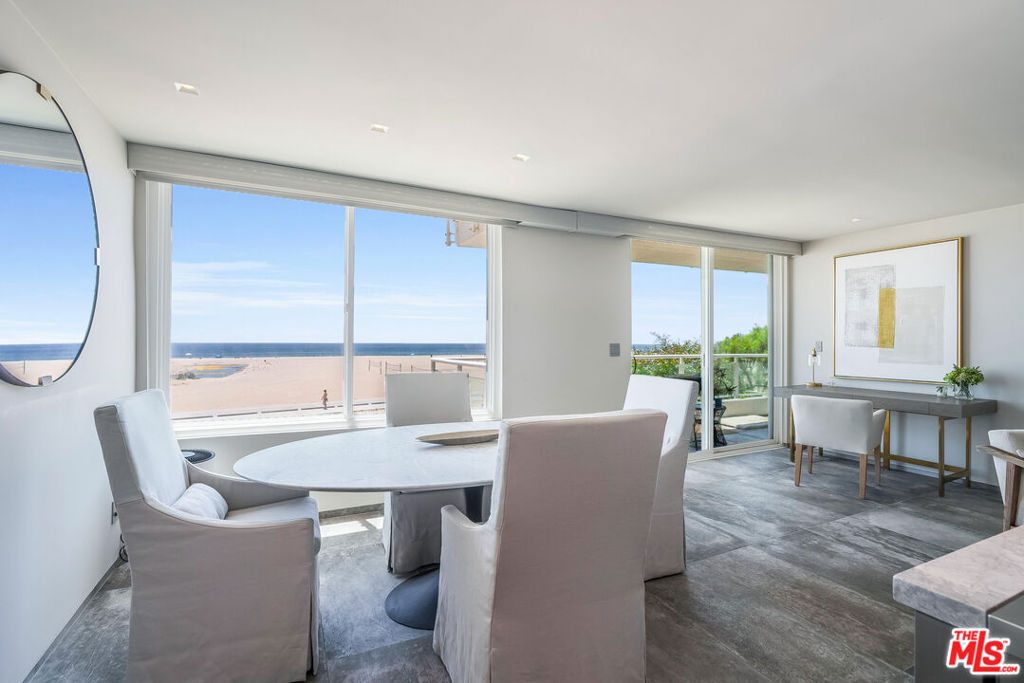 Perched along the sand on Palisades Beach Road, this meticulously renovated, spacious 2 bed/ 2 bath beachfront sanctuary offers an exceptional blend of contemporary elegance and highly coveted coastal living. Upon entering, enjoy breathtaking waterfront views from the boardwalk to the ocean waves crashing on the shoreline. This well appointed residence features designer artwork, furnishings, appliances, fixtures and sophisticated finishes. The gourmet kitchen features a Bertazzoni oven/range, engineered in Italy and complemented by sleek Kitchen Aid appliances. Embrace the enchanting coastline views from every room as you unwind, entertain, or discover cherished moments of tranquility whether you stay indoors or admire a sunset from the oversized balcony all while in close proximity to countless shops, restaurants and all Santa Monica has to offer. After a day at the beach, enjoy a luxurious steam shower followed by movie nights enhanced with a premium Sonos soundbar for an immersive sound experience. Be pampered in the bathrooms as they offer smart OVE toilets boasting a variety of bidet and temperature settings. The inviting Primary bedroom offers panoramic views, ample closet space and balcony access. The secondary bedroom is quite cozy with a private en suite balcony and access to the well equipped laundry room. Amenities include a fitness center, intercom access, 2 gated assigned parking spaces, storage and guest parking.