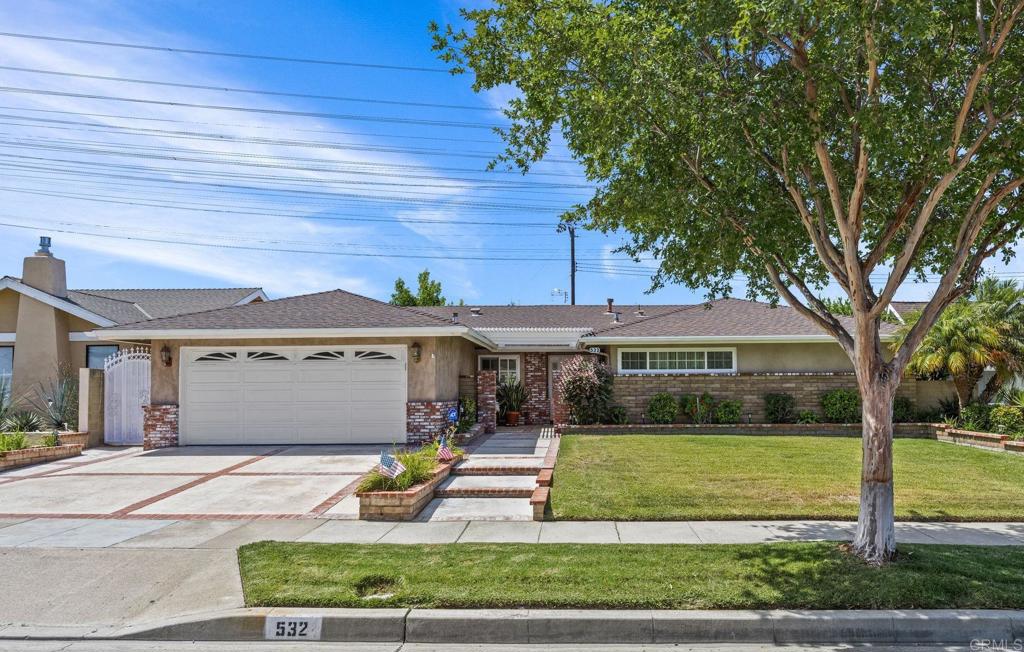 This single story house in the Heart of Orange and just minutes to either The Circle in Old Town or Villa Park, with easy access to the 55 Freeway is ready to be called your next HOME! Originally constructed in a traditional Ranch Style with a touch of Mid-Century, where all bedrooms are located to one side, you'll be happy to find it also includes two bonus rooms at the opposite end, ideal for use as a home office or guest suite that features two separate entrances. Modern updates such as Plantation Shutters, Central Heating & AC along with Dual Pane Windows are present throughout the interior, all added with the intent of making the home a comfortable place to reside in, summer or winter. While outdoors, the oasis-like backyard is a joy to the eye and pleasure to relax in where you'll find a shaded patio centered around a bubbling fountain, a built-in BBQ with bar-style seating, and a host of fruit bearing trees. With all this in store and so much more, what are you waiting for? Make your appointment to come see it today, then make an offer and make it your own!