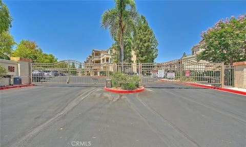 Photo of 1020 Vista Del Cerro DR #305, Corona, CA 92879 (MLS # IG26180732)