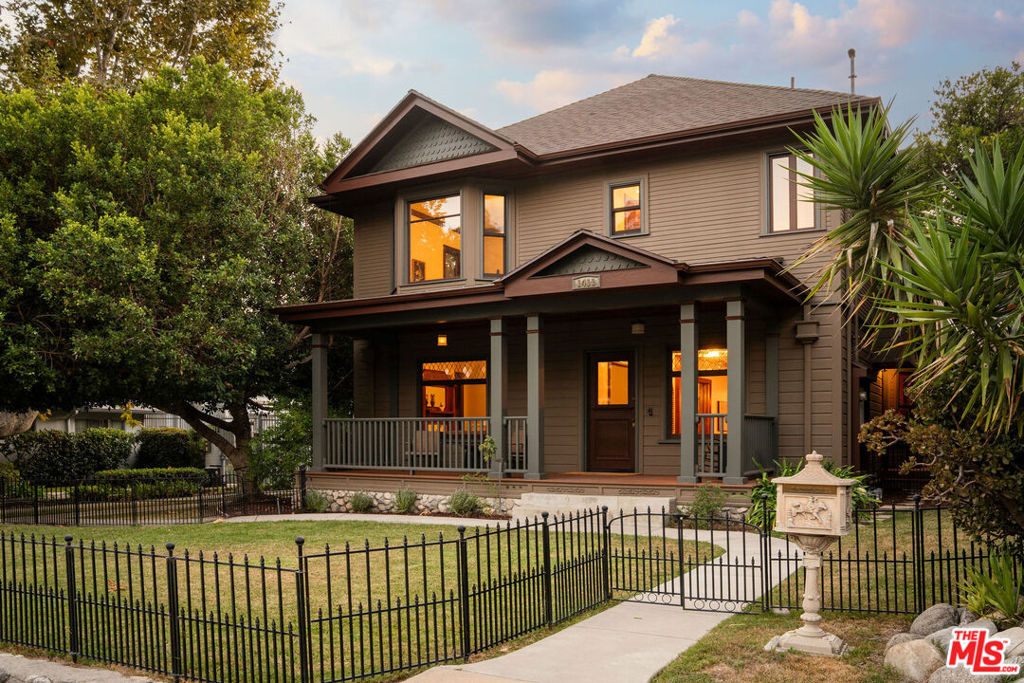 :: The Simpson Estate, 1909 :: Designed by a recipient of the City of Pasadena's Historic Preservation Award. A Pasadena Legacy Reimagined :: The Simpson Estate, 1909 :: This landmark property is a masterclass in architectural integrity and thoughtful restoration. Set on nearly 17,000 sq. ft. in the heart of Pasadena, the estate bridges more than a century of history with the comforts of modern living. From its origins as a family home in 1909when poultry and goats roamed the grounds to its careful century-later restoration, The Simpson Estate has been entrusted to dedicated stewards who safeguarded its soul while preparing it for future generations. Timeless Architecture, Modern Comfort Anchoring the property is a stately four-bedroom, four-bath main residence, reimagined with both grace and functionality. Grand entry bathed in natural light through custom double-pane Victorian-style windows. Original-style details intact include hardwood floors, handcrafted moldings, ornate fireplace mantle, decorative columns. Refined flow: media room/den, spacious formal living room, and elegant dining area. Chef's kitchen: Wolf range, Sub-Zero refrigerator, apron-front sink, prep island, vintage-inspired lighting, and custom cabinetry. Convenience: dedicated laundry/mudroom and a main-level guest suite. Upstairs, three bedrooms include a serene primary suite with dual walk-in closets, a spa-like bath with double vanities, vintage mirrors, and a soaking tub. Secondary bedrooms feature en-suite baths and generous closets. An accessible attic adds further storage. Expansive Grounds & Guest Residence The nearly half-acre lot offers a private outdoor retreat with room for a pool. At the rear, a detached 2-bedroom, 1-bath guest house with its own kitchen provides versatility perfect for extended family, guests, an au pair, or additional income. Additional amenities include: Garage and carport, each with attic storage, Ample parking, Endless potential for outdoor living and entertaining A Rare Opportunity 1411 N. Los Robles is more than a homeit's a piece of Pasadena's cultural and architectural history. With its award-winning preservation, thoughtful modernization, and versatile compound layout, The Simpson Estate is a true legacy property, blending historic elegance with contemporary ease.