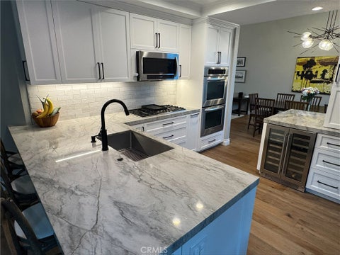 Photo of 20752 Raintree LN, Rancho Santa Margarita, CA 92679 (MLS # OC26191520)