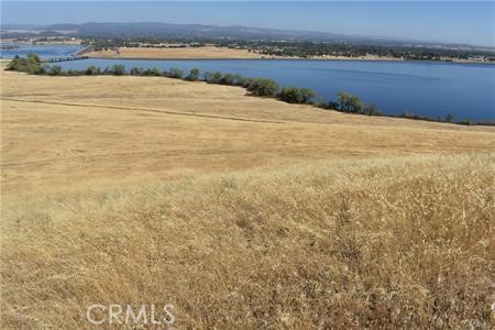 Water Views – 3.45 Acres with Stunning Panoramic Vistas
Nestled just off paved Nelson Avenue near the historic Gold Rush town of Oroville, this 3.45-acre parcel offers the perfect blend of convenience and tranquility. Only minutes from freeway access and everyday amenities, yet surrounded by the beauty of nature, this property is the ideal blank canvas for your vision.
Enjoy sweeping views of the Forebay, Table Mountain, and the picturesque foothills. On clear days, you can even spot the train passing near Table Mountain, adding to the property’s rural charm.
The land is fully fenced and surveyed, complete with a secure entrance gate and a level building area ready for your future plans—whether that’s a private getaway, a dream home, or even a charming tiny home retreat.
This is your opportunity to create your own piece of paradise. Bring your vision and make it a reality today!