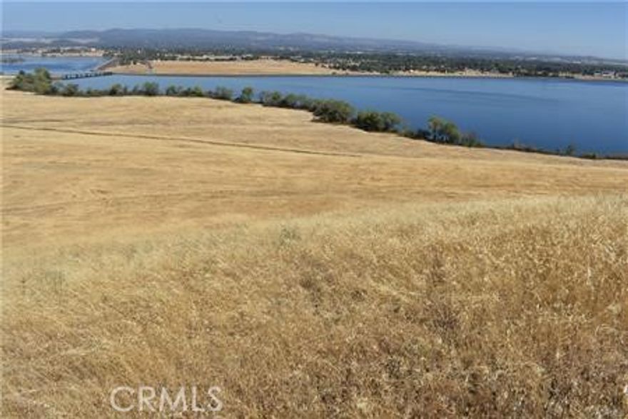 Water Views – 3.45 Acres with Stunning Panoramic Vistas



Nestled just off paved Nelson Avenue near the historic Gold Rush town of Oroville, this 3.45-acre parcel offers the perfect blend of convenience and tranquility. Only minutes from freeway access and everyday amenities, yet surrounded by the beauty of nature, this property is the ideal blank canvas for your vision.



Enjoy sweeping views of the Forebay, Table Mountain, and the picturesque foothills. On clear days, you can even spot the train passing near Table Mountain, adding to the property’s rural charm.



The land is fully fenced and surveyed, complete with a secure entrance gate and a level building area ready for your future plans—whether that’s a private getaway, a dream home, or even a charming tiny home retreat.



This is your opportunity to create your own piece of paradise. Bring your vision and make it a reality today!